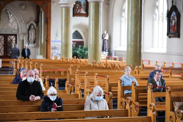 Press Eye - Belfast - Northern Ireland - 20th May 2020 -  

General view of parishioners at St Peter’s Cathedral in west Belfast pray under strict social distancing as churches in Northern Ireland have reopened today for individual prayer.
 
Photo by Kelvin Boyes / Press Eye.