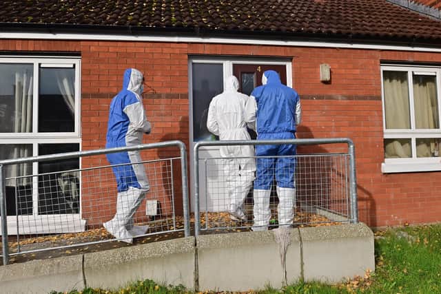 Forensics at the scene of the murder of 54-year-old Tony Browne in Poleglass in west Belfast