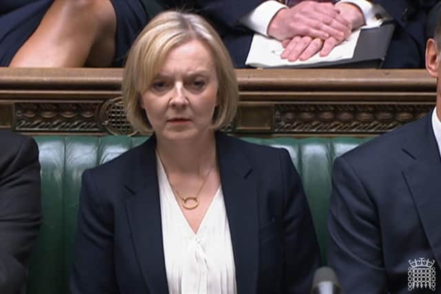 Prime Minister Liz Truss reacts during Prime Minister's Questions in the House of Commons, London. PA Photo. Picture date: Wednesday October 19, 2022. PA Photo. See PA story POLITICS PMQs Truss. Photo credit should read: House of Commons/PA Wire