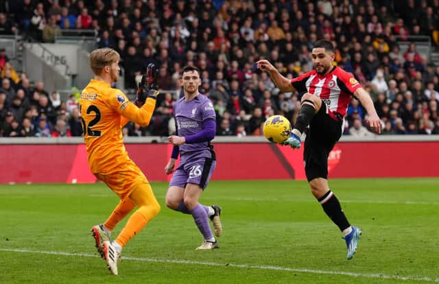 Brentford's Neal Maupay tries to beat Liverpool goalkeeper Caoimhin Kelleher during the Premier League match at the Gtech Community Stadium, London. (Photo by John Walton/PA Wire)