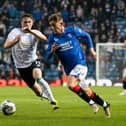 Rangers' Robbie Fraser and Dundee's Finlay Robertson in action during a cinch Premiership match at Ibrox