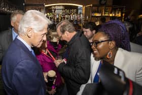 Former US President Bill Clinton speaking with new Derry and Strabane District Mayor Lilian Seenoi-Barr