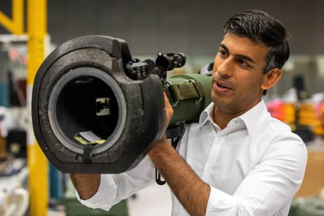 Rishi Sunak looks at a NLAW anti tank launcher, supplied to Ukraine, during a campaign visit in August 2022 to Thales Defence System plant in Belfast, as part of his campaign to be leader of the Conservative Party and the next prime minister