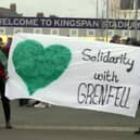 Grenfell campaigners protest at an Ulster match in January 2022