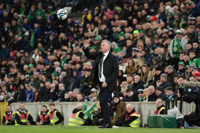 Northern Ireland manager Michael O'Neill rues his decision to not play abroad as he urges more younger players to 'look beyond England'