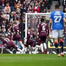 Rangers' Cyriel Dessers (left) scores the opening goal of the Scottish Gas Scottish Cup semi-final win over Hearts at Hampden Park. (Photo by Andrew Milligan/PA Wire)