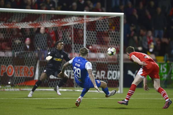 Andy Ryan puts Larne into a 2-0 lead over Cliftonville at Solitude as the Sports Direct Premiership leaders protected a position at the top of the table. (Photo by Arthur Allison/Pacemaker Press)