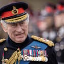 King Charles III inspecting the Officer Cadets on parade during the 200th Sovereign's Parade at the Royal Military Academy Sandhurst