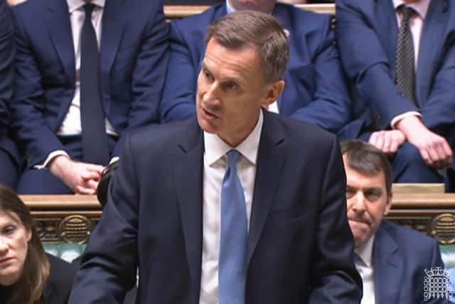 Chancellor of the Exchequer Jeremy Hunt  delivering his Budget to the House of Commons in London