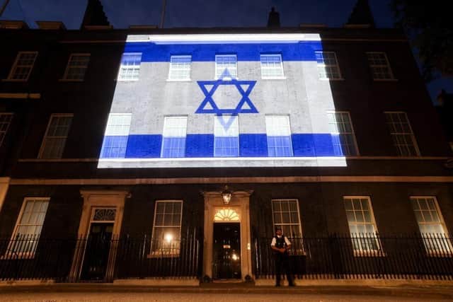 The Israeli flag projected onto 10 Downing Street in an image shared by Rishi Sunak on Twitter