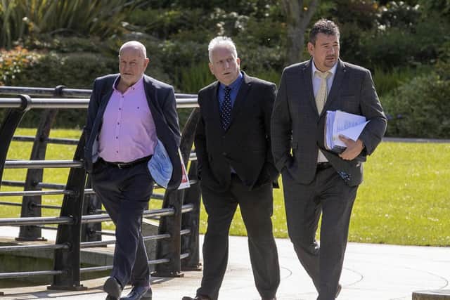 (left to right) George Emerson, Conor Jordan and Colin Emerson, directors of Norman Emerson Group Limited arriving after a lunch recess at Killymeal House in the Belfast Gasworks, Belfast, as they arrive to give evidence during the  industrial tribunal of Co Armagh lorry driver, Andrew McDade who has claimed he was unfairly dismissed from the company after sharing a video on social media which included offensive chanting about murder victim Michaela McAreavey. Picture date: Tuesday May 16, 2023. PA Photo. See PA story ULSTER McAreavey. Photo credit should read: Liam McBurney/PA Wire 