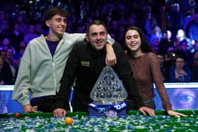 Ronnie O'Sullivan poses with the Paul Hunter trophy alongside his children, Ronnie Jr and Lily, after victory over Ali Carter in the MrQ Masters final at Alexandra Palace. (Photo by Bradley Collyer/PA Wire)
