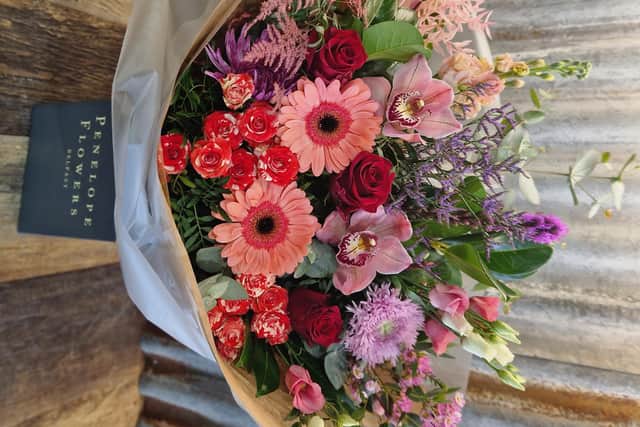 Penny said: "Our best seller this year is a mixed bouquet which has three red roses in it to signify the words ‘I love you’ along with a seasonal selection of pinks and purples.”
