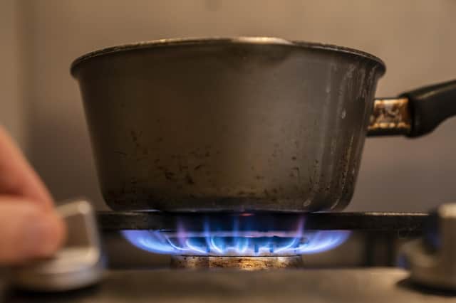 A saucepan on a gas hob. PA image