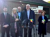 Gavin Robinson MP (centre right) speaks to media at Police Service of Northern Ireland headquarters in east Belfast after meeting Chief Constable Jon Boutcher.