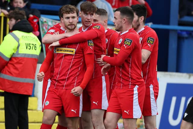 Ben Wilson celebrates his goal for Cliftonville during Saturday's game at The Showgrounds