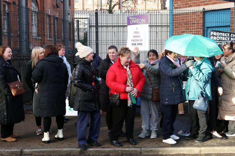 Healthcare Workers pictured at Royal Victoria Hospital, Belfast.More than 25,000 healthcare staff in Northern Ireland have begun a one-day strike as part of a pay dispute.