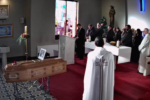 Eleven family and friends queued up to read tributes and prayers at the funeral of Patrick Rogers today. The 26-year-old Cookstown father-of-four died in a tragic road collision on Boxing Day.