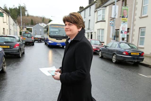DUP leader Arlene Foster on her way cast her vote this morning.