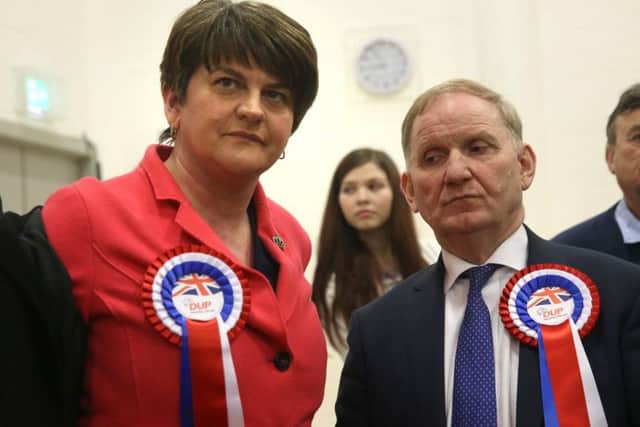 DUP leader Arlene Foster with Lord Morrow at the Fermanagh and South Tyrone count centre on Friday.