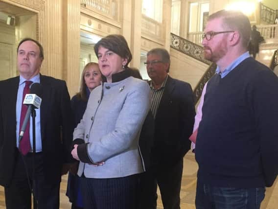 DUP leader Arlene Foster (centre) speaking in Great Hall of Parliament Buildings, Belfast as prospects of a deal to save powersharing in Northern Ireland look bleak after the first week of talks ended in negativity and recriminations.