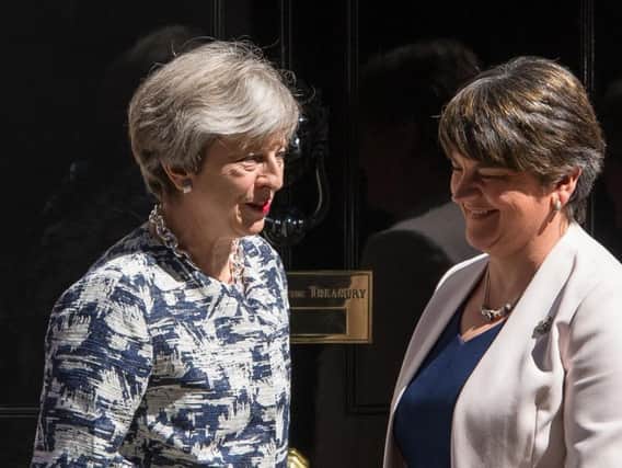 File photo dated 26/6/2017 of Prime Minister Theresa Ma ywith DUP leader Arlene Foster outside 10 Downing Street in London. May has been accused of jeopardising peace in Northern Ireland, after reaching a 1 billion deal with the Democratic Unionist Party to prop up her minority Government.