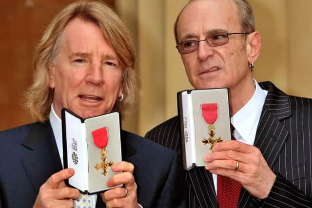 Rick Parfitt and Francis Rossi, founding members of Status Quo, with their OBEs