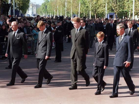 File photo dated 06/09/1997 of (left to right) The Duke of Edinburgh, Prince William, Earl Spencer, Prince Harry and the Prince of Wales walking behind the coffin of Diana, Princess of Wales during her funeral procession to Westminster Abbey
