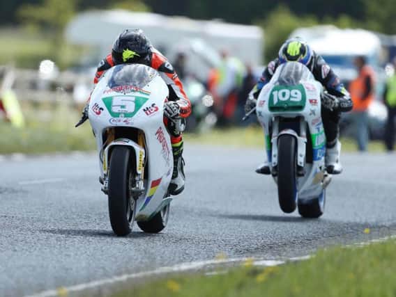 Bruce Anstey and Neil Kernohan during the Lightweight pratice session on Wednesday at Dundrod. Anstey is making his 2-stroke debut at the Ulster Grand Prix this year on the Padgetts Honda RS250.