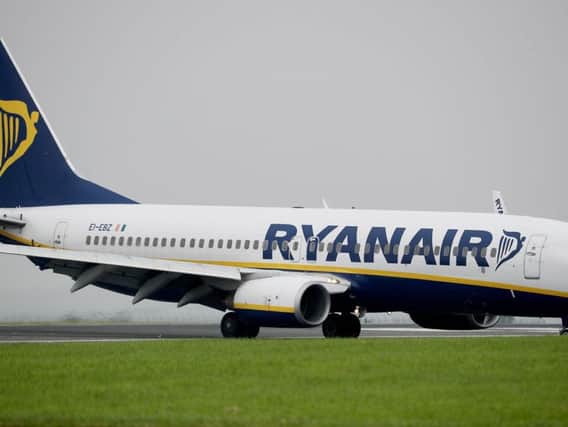 File photo dated 02/07/12 of a Ryanair plane, as Ireland's aviation regulator has said Ryanair must offer alternative flights or a full refund if it cancels a service.