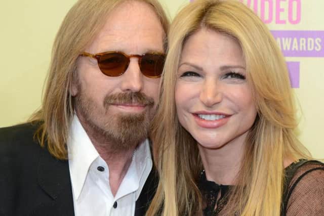 File photo dated 06/09/12 of American musician, singer and songwriter Tom Petty, whio has died aged 60, and his wife, Dana