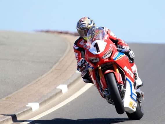 John McGuinness in action on the Honda Racing Fireblade SP2 during practice at the North West 200 in May.
