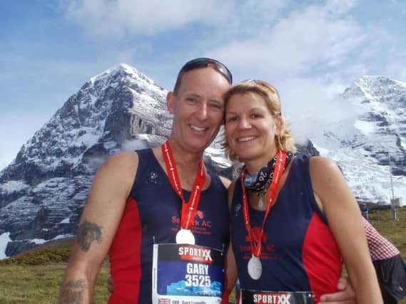 Gillian and Gary at the Jungfrau Marathon in Switzerland.  INCT 44-750-CON