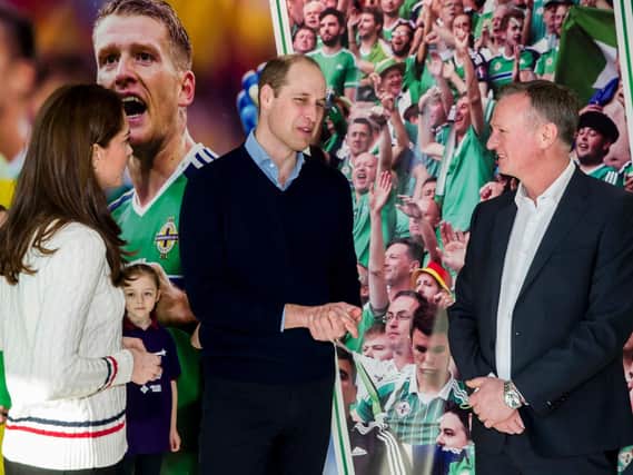 The Royal couple meeting Michael O'Neill at Windsor Park