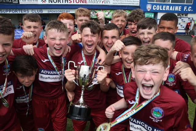 Greenisland FC celebrate as they lift the SuperCupNI 2018 U13 Section trophy.
