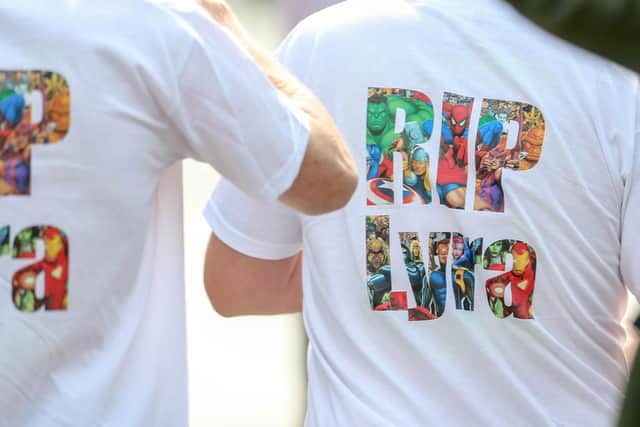 Friends of Lyra McKee wearing t-shirts with the slogan 'R.I.P. Lyra' at the 29 year-old murdered journalist's funeral.