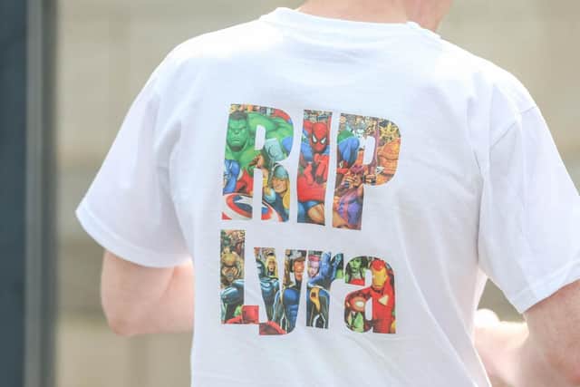 Friends of Lyra McKee wearing t-shirts with the slogan 'R.I.P. Lyra' at the 29 year-old murdered journalist's funeral.