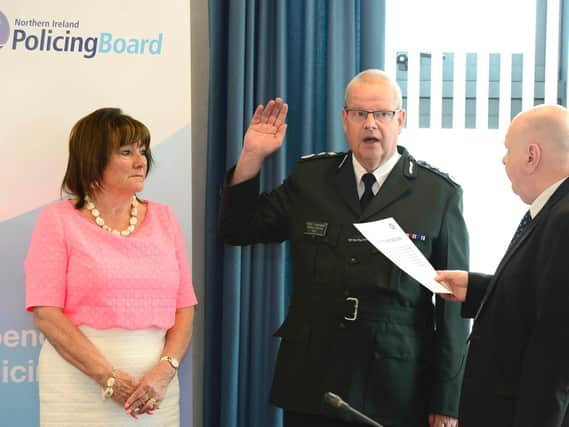 Simon Byrne has officially taken over as the chief constable of the Police Service of Northern Ireland (PSNI) on a five-year contract. Included are Policing Board Chair Anne Connolly and Prof David A Flynn Justice of the Peace.