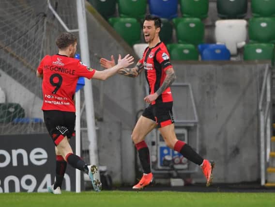 Declan Caddell celebrates after breaking the deadlock in Crusader's favour against Linfield.