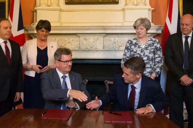 The moment the DUP and the Tories formalised their confidence and supply agreement in Downing Street