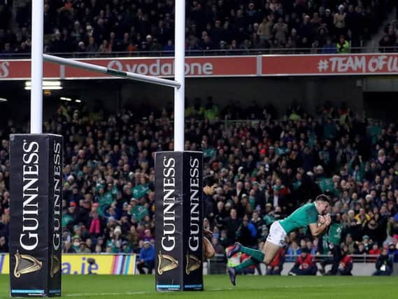 Jacob Stockdale goes over for his first try against Argentina