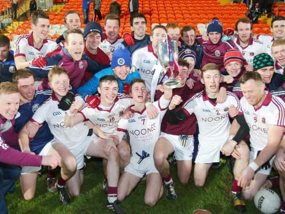 Slaughtneil celebrate completing a unique 'double treble' with victory over Cavan Gaels in the Ulster Senior Football Championship Final at the Athletic Grounds, Armagh.