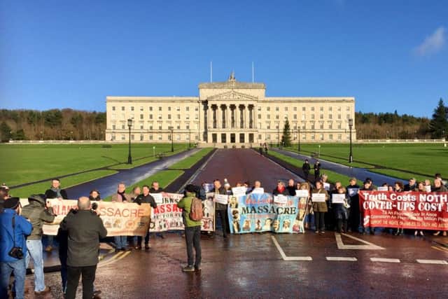 Families of victims and survivors of atrocities in the Troubles protest outside Stormont, Belfast to show their opposition to a proposed statute of limitations for killings in the conflict