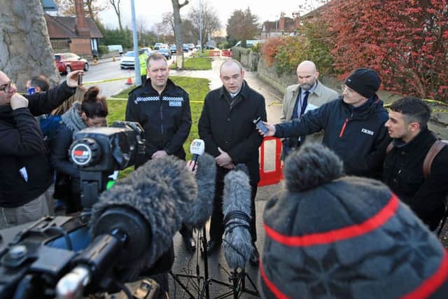 Superintendent Matt Davison (left) and Detective Chief Inspector Jim Griffiths of West Yorkshire Police speak to the media at the scene of a car crash in Stonegate Road, Leeds, that claimed the lives of five people, including three children