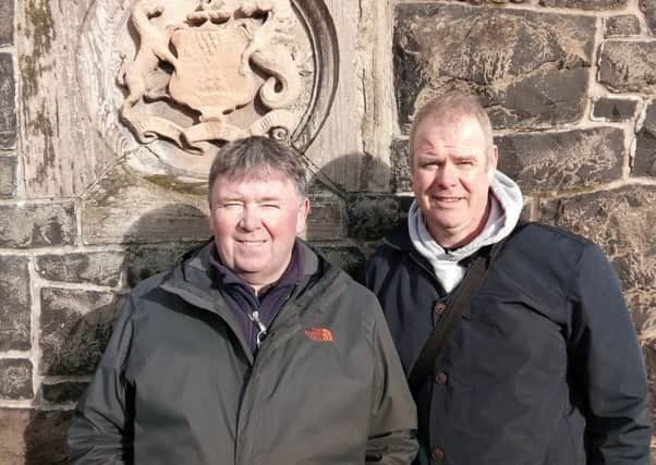 Aidan Crean and Dara Barrett who are taking the Belfast Cemetery tours