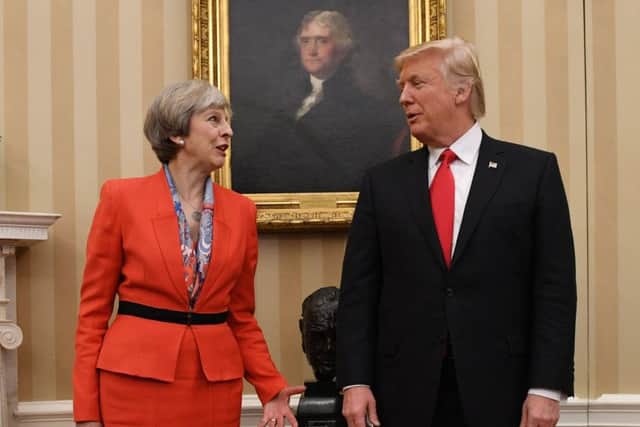 File photo dated 27/01/17 of Prime Minister Theresa May meeting US President Donald Trump. Photo: Stefan Rousseau/PA Wire