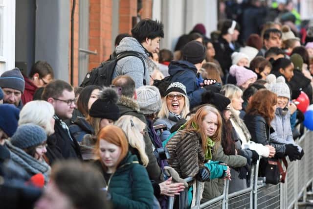Crowds gather outside the Nottingham Contemporary in Nottingham, ahead of a visit by Prince Harry and Meghan Markle to a Terrence Higgins Trust World AIDS Day charity fair on their first official engagement together.