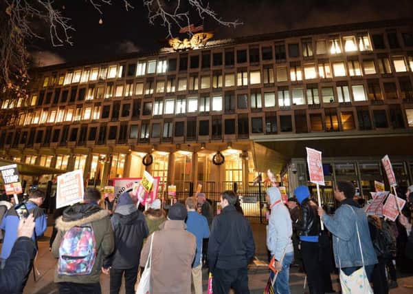 People take part in a protest organised by Stand Up To Racism outside the US Embassy in London after Donald Trump shared anti-Muslim videos posted online by the far-right group Britain First. . Photo: John Stillwell/PA Wire