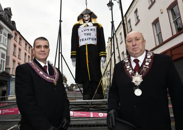 Jim Brownlee, right, Governor, and Graeme Stenhouse, Lieutenant Governor of the General Committee, pictured beside the effigy of Lundy. INLS4916-107KM