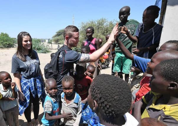 Champion boxer Carl Frampton and wife Christine spent four days in Kenya with TrÃ³caire
